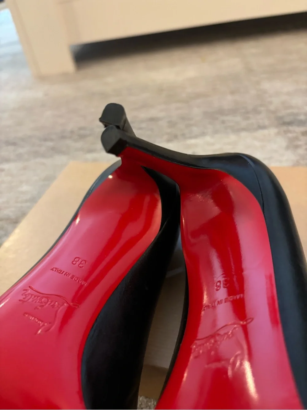 Christian Louboutin Black Leather Round-Toe Pumps with Red Soles